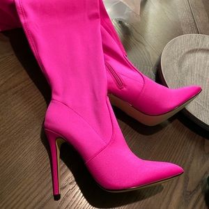 Hot pink thigh high boots